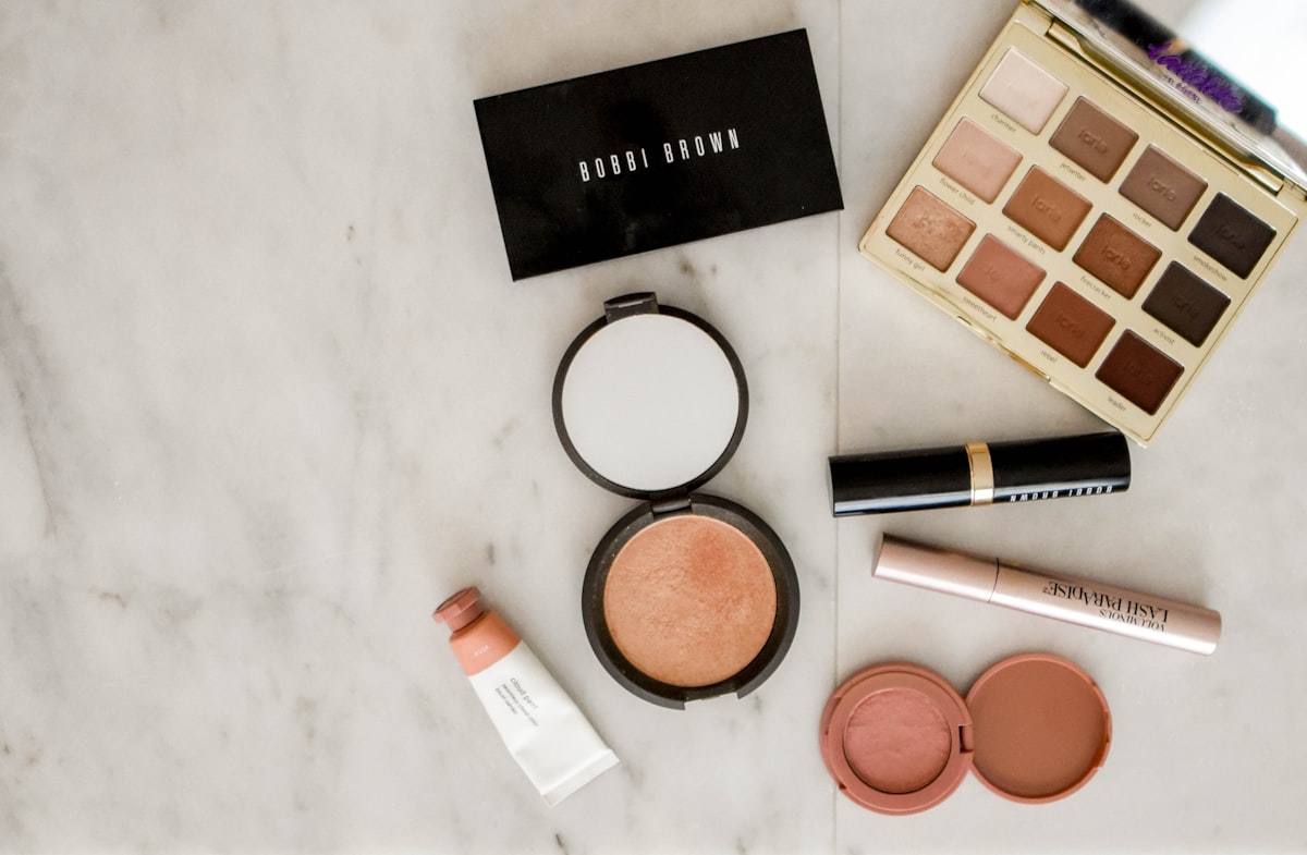Charlotte Tilbury and other luxury lipsticks arrayed on a marble vanity